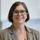 A photo of a woman wearing glasses